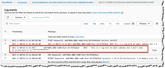 Redaction of sensitive information in a CloudWatch log group